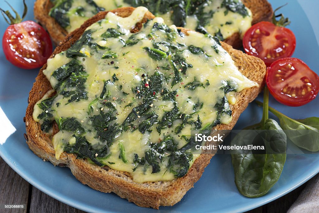 Spinach and cheese sandwich Spinach and cheese open face sandwich for lunch Bread Stock Photo