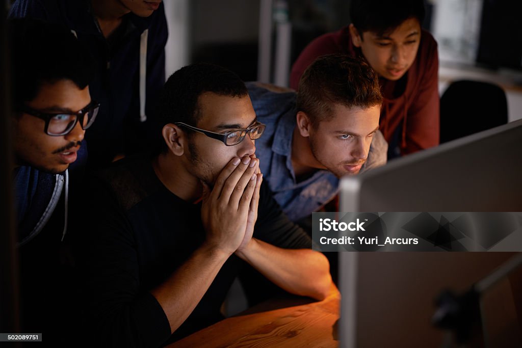 You could cut the tension with a knife... Shot of a group of young designers staring tensely at a monitorhttp://195.154.178.81/DATA/i_collage/pi/shoots/783867.jpg Shock Stock Photo
