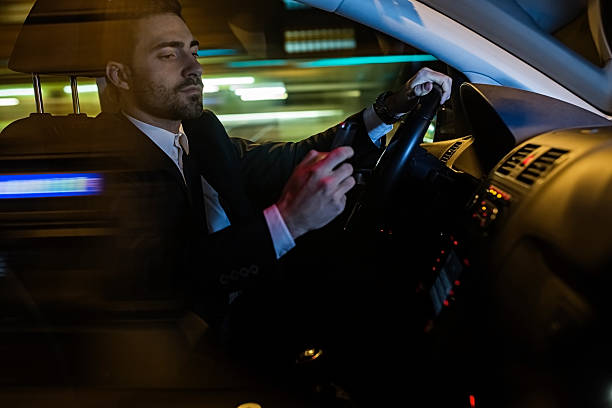 istock Businessman driving car 502091536