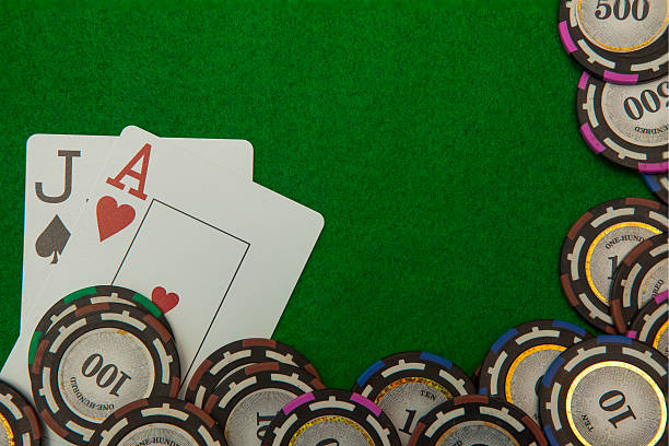istock Jack and ace blackjack cards with chips on green background 502092191