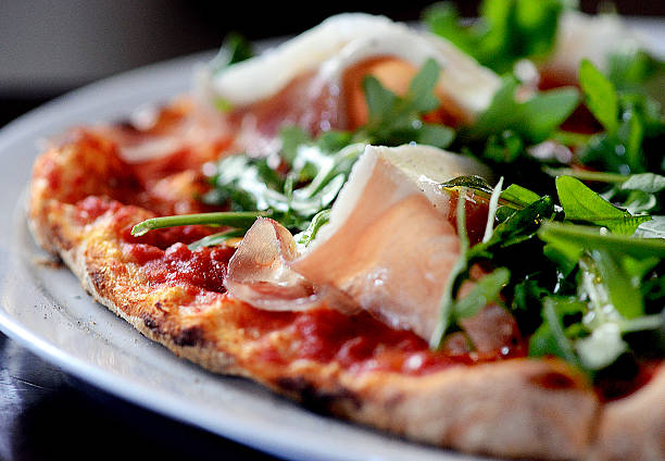 istock Handmade Pizza with Arugula and Prosciutto 502093168