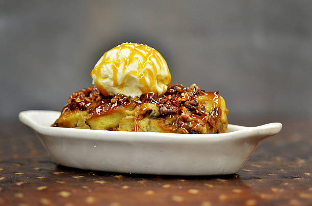 istock Bread Pudding with Vanilla Ice Cream and Caramel Drizzle 502094258