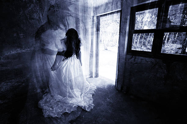 Mother Never Let Me Go Ghost in Haunted House,Mysterious Woman in White Dress Standing in Abandon Building,Horror Background For Halloween Concept and Book Cover Ideas never the same stock pictures, royalty-free photos & images