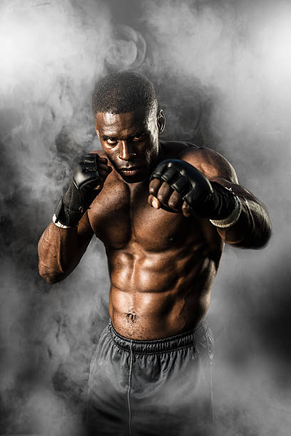MMA Fighter On A Smokey  Background stock photo