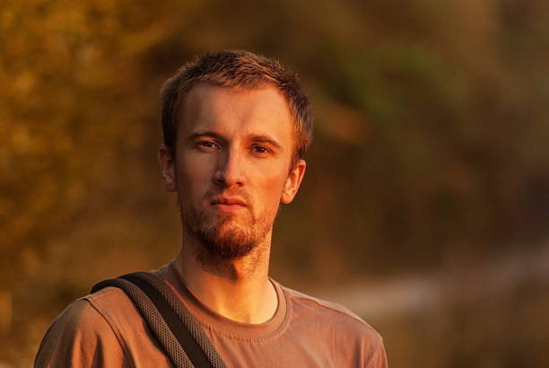 istock handsome young man relaxing outdoor 502099396