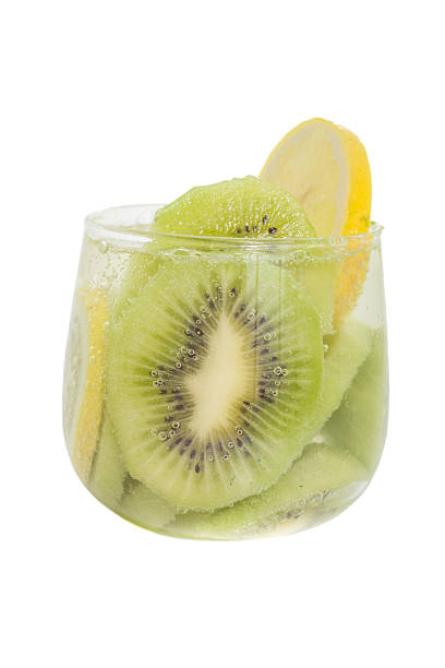 Kiwi fruit and lemon slice with soda water Kiwi fruit and lemon slice with soda water make detox water recipe soda water glass lemon stock pictures, royalty-free photos & images