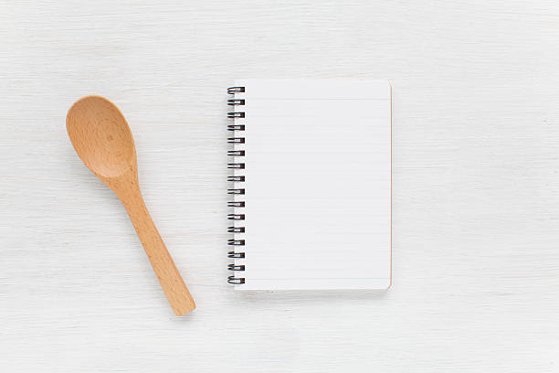 istock Empty notebook and kitchen utensils for food recipes 502100180