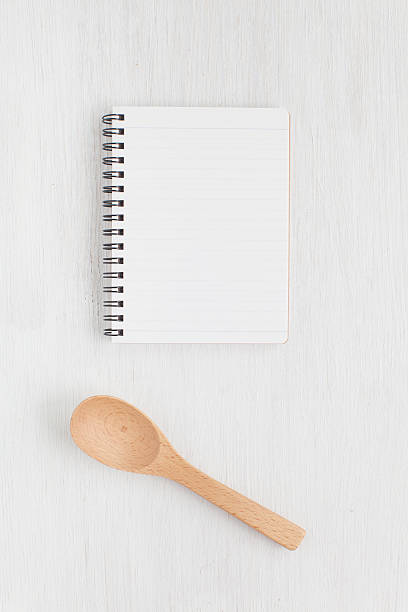 istock Empty notebook and kitchen utensils for food recipes 502100202