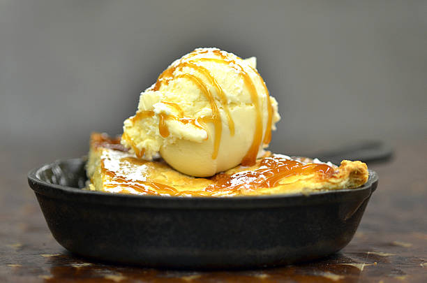 istock Skillet Apple Pie with Vanilla Ice Cream and Caramel Drizzle 502100700