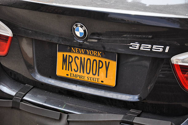 "MRSNOOPY" numberplate - New York, USA New York, USA - April 11, 2011: Humorous number plate saying "MRSNOOPY" on a BMW 3 series. New York, USA new york state license plate stock pictures, royalty-free photos & images