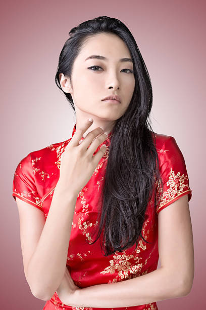 Chinese woman dress traditional cheongsam stock photo
