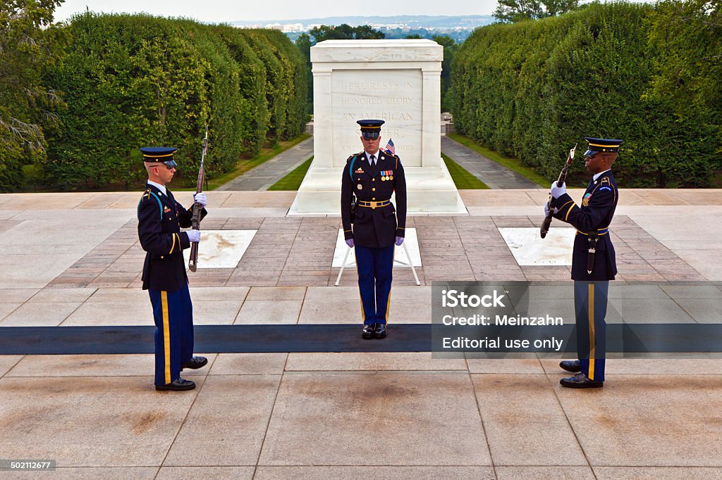 changing the guard at Arlington national Cemetery in Washington Arlington, USA - July 15, 2010: changing the guard in the afternoon at the grave of the unknown soldier at the cemetery of Arlington in Washington, USA Tomb Of The Unknown Soldier - Arlington Stock Photo