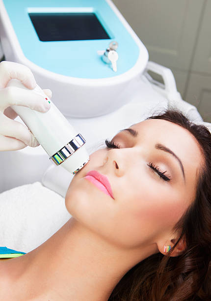 istock Woman getting laser face treatment 502117935