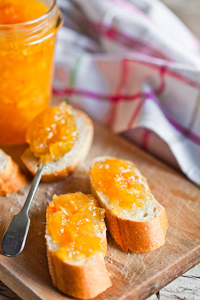 istock pieces of baguette with orange marmalade 502117986