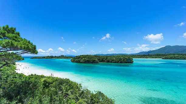 Tropical lagoon with clear turquoise water and white sand beach, Kabira Bay, Ishigaki Island National Park of the Yaeyama Islands, Okinawa, Japan