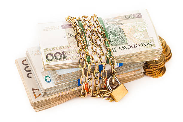 istock money chain and lock isolated on white 502124250