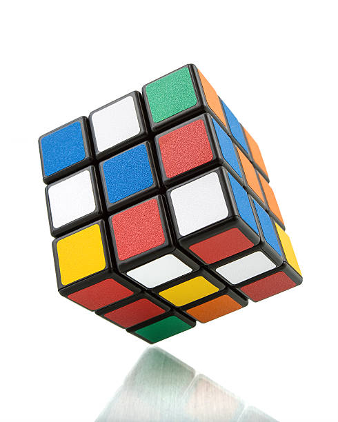 Classic Rubik's cube Kragujevac, Serbia - December 13, 2015: Rubik's 3x3x3 Cube on a white background. Rubik's Cube invented by a Hungarian architect Ernő Rubik in 1974. puzzle cube stock pictures, royalty-free photos & images