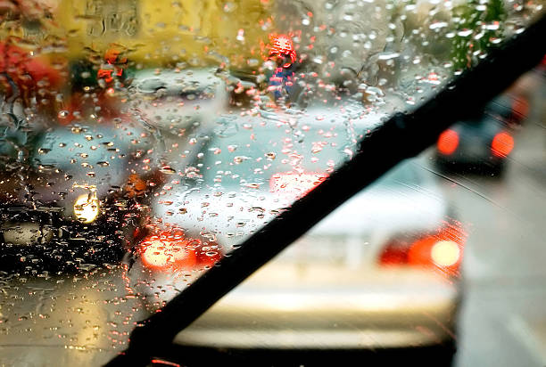 Windshield wipers Windshield wipers from inside car windshield wiper photos stock pictures, royalty-free photos & images