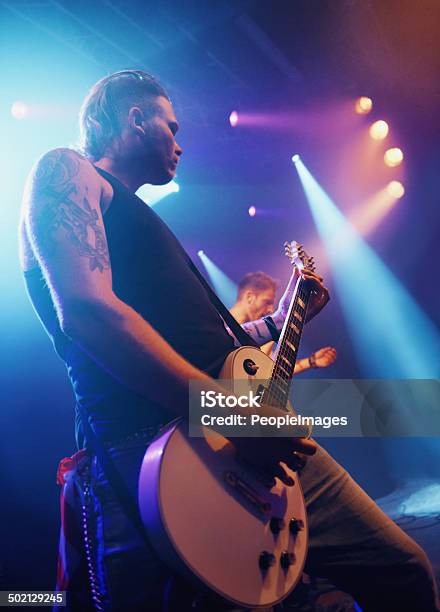 At One With His Guitar Stock Photo - Download Image Now - Performance Group, 20-29 Years, Adult