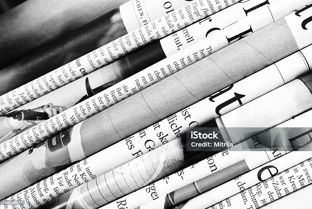 Folded newspapers background Close-up of folded newspapers Journalism Stock Photo