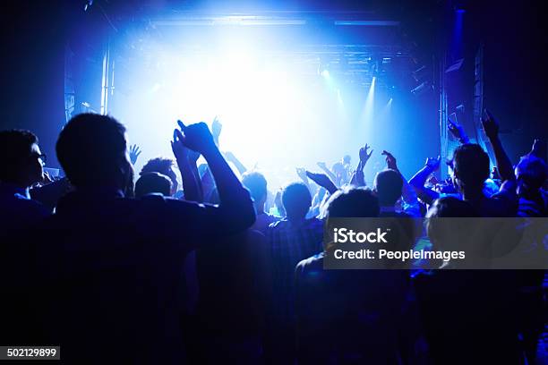 Captivated By The Music Stock Photo - Download Image Now - Adult, Adults Only, Arms Raised