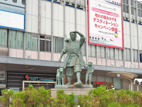 Okayama, Japan - November 20, 2015: The statue of Momotaro and his friends - monkey, dog and pheasant in front of Okayama railway station.