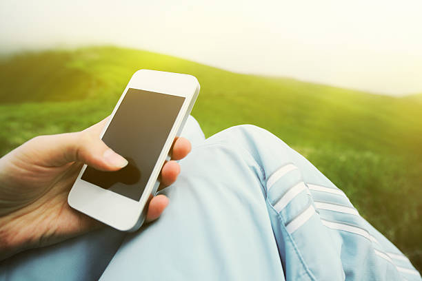 istock Woman using smartphone in mountains 502131263