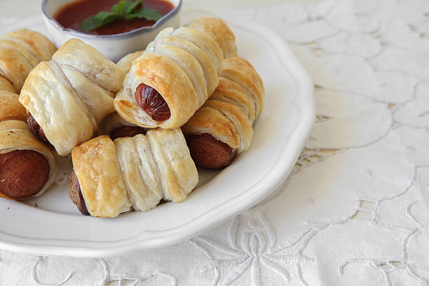 istock Homemade mini sausage rolls, selective focus, copy space backgro 502131290