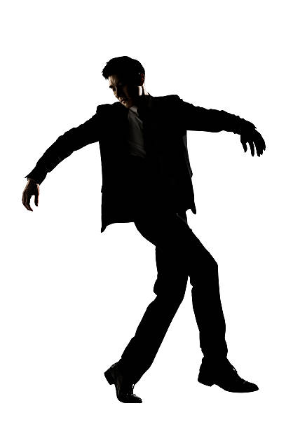 istock Silhouette of Asian businessman dancing 502132149