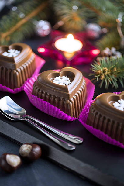 Chocolate Heart Cake with White Snowflake for New Year's Eve stock photo