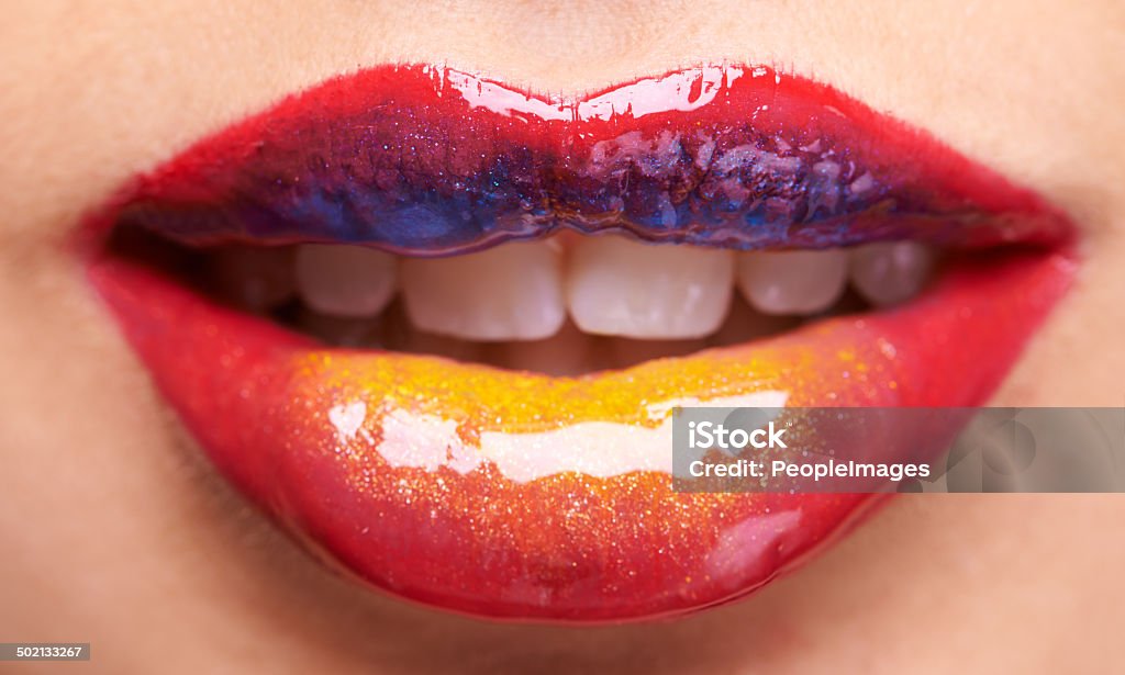 She'll have a kiss full of colour Cropped shot of a woman's multicoloured lipshttp://195.154.178.81/DATA/i_collage/pi/shoots/783619.jpg Adult Stock Photo