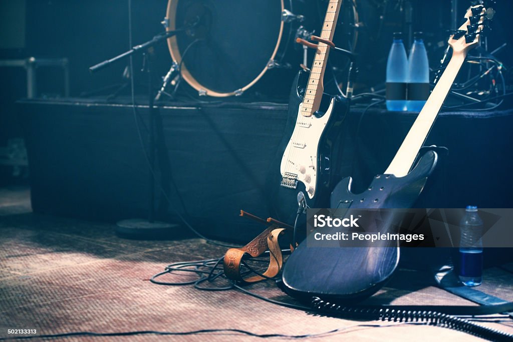Waiting to be played Musical instruments on an empty stage before a show. Stage - Performance Space Stock Photo