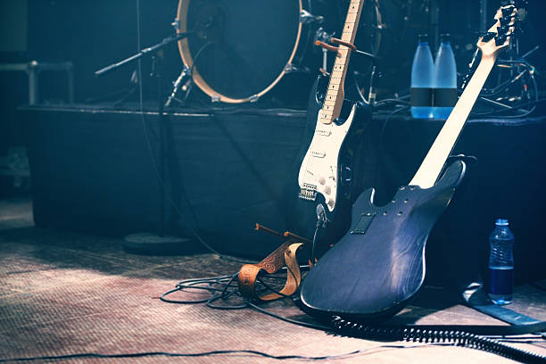 Waiting to be played Musical instruments on an empty stage before a show. musical equipment photos stock pictures, royalty-free photos & images