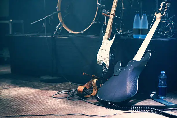 Musical instruments on an empty stage before a show.