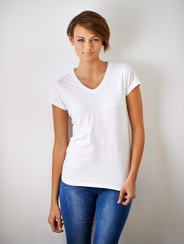 A cropped portrait of a beautiful young woman in jeans and a t shirthttp://195.154.178.81/DATA/i_collage/pi/shoots/783717.jpg