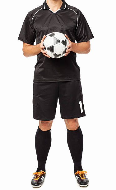 istock Low Section Of Soccer Referee Holding Ball 502135105