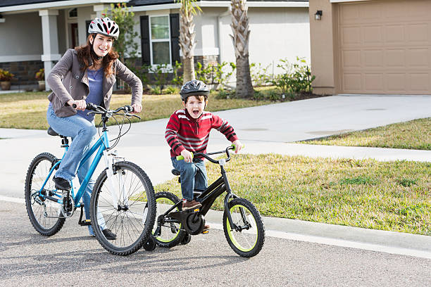 istock Mother and son riding bikes 502135131