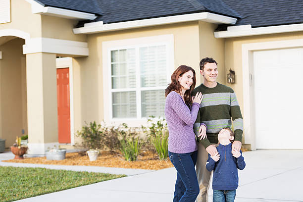 istock Young family outside home 502135147