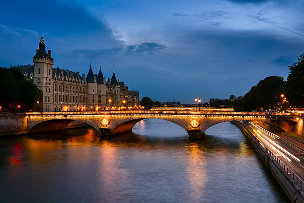 istock Palais de Justice, night view over the Seine 502136843