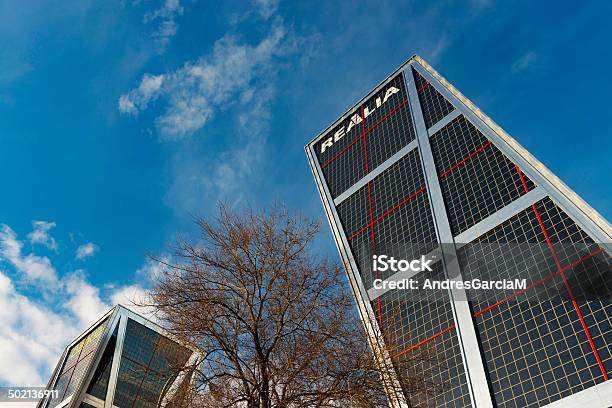 Puerta De Europa Leaing Twin Towers In Madrid Stock Photo - Download Image Now - Architecture, Blue, Building Exterior