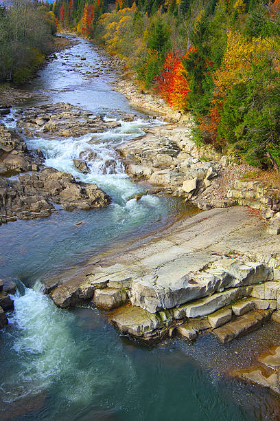 istock River in mountains at autumn 502148560