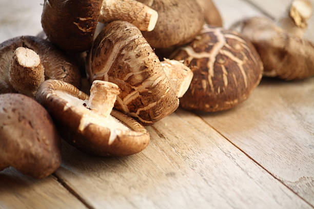 istock Shitake mushrooms on wood 502154504