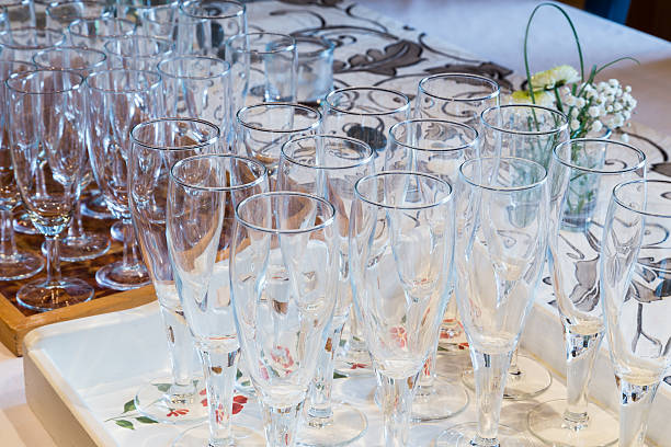 Champagne flutes on a tray stock photo