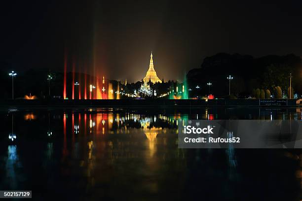 Fountain With Colorful Illuminations At Night Near The Shwedagon Stock Photo - Download Image Now