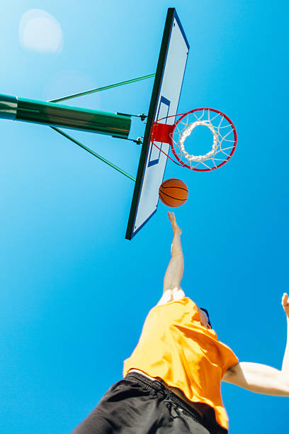 istock Basketball player dunking in hoop 502157650