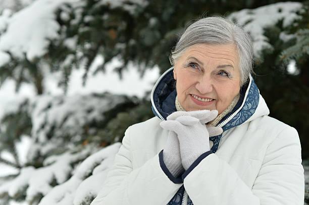 istock Old woman in the winter 502157948