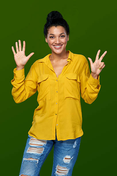 istock Woman showing eight fingers 502158830