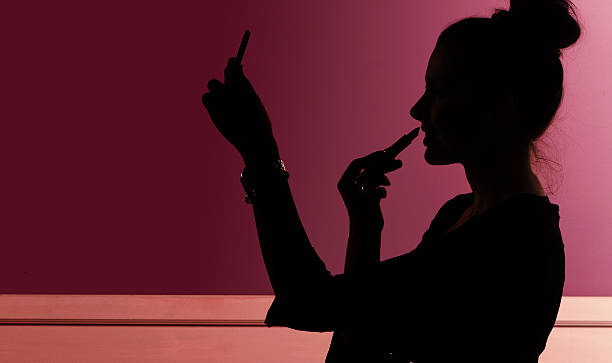 istock Young elegant woman preparing herself for the party 502159649