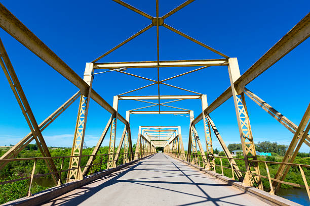 istock Empty retro large green two lanes metal bridge in Uruguay 502159652