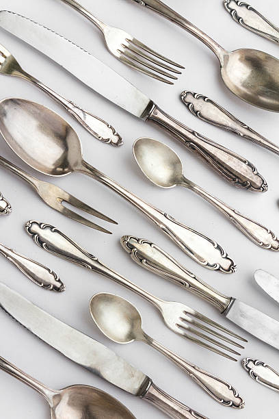 istock beautiful sterling cutlery set on white background 502159880